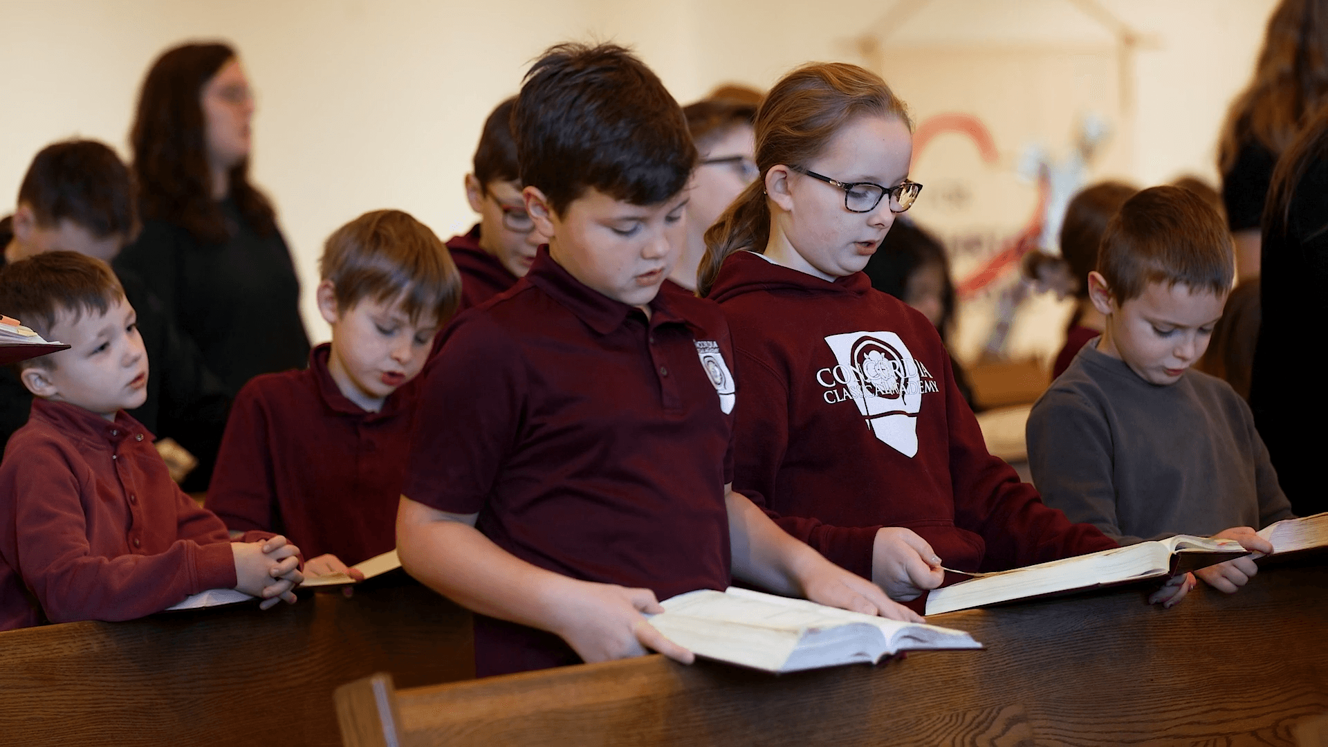 Chapel families praying together